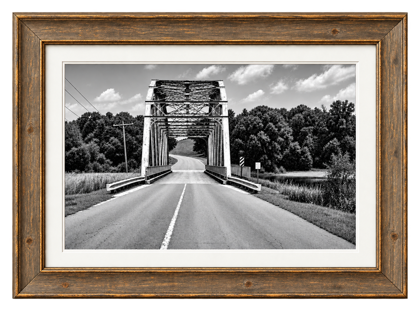 Framed black-and-white bridge photograph near Kingston